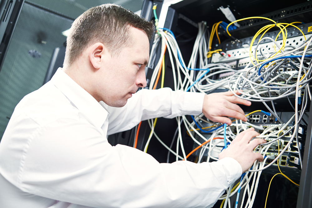 network engineer administrating in server room
